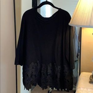 Black sweater with decorative Flower cut out trim